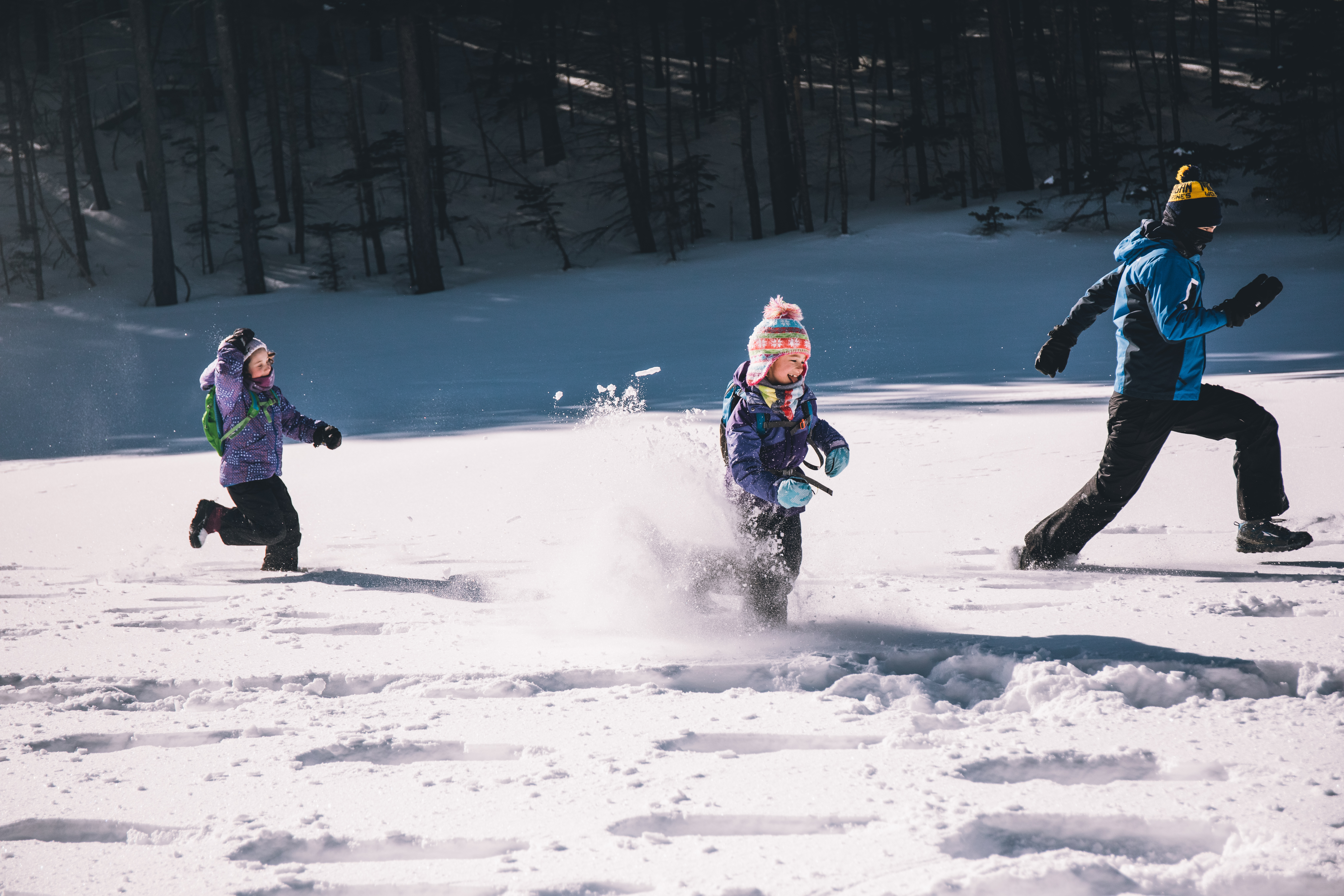 Family running in snow