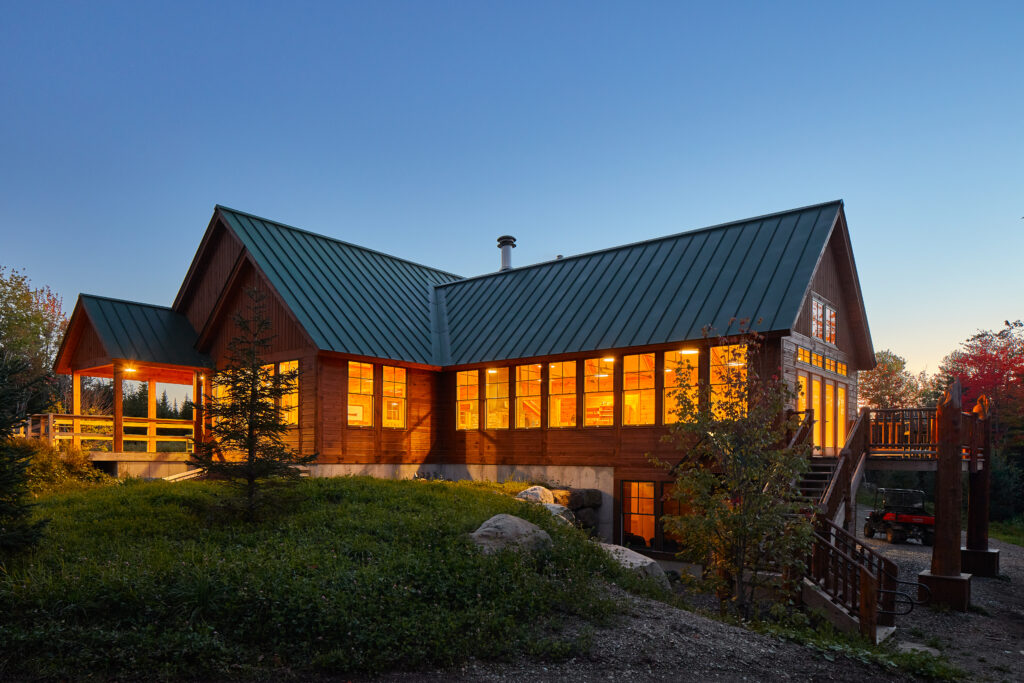 Medawisla lodge lit up from the inside.