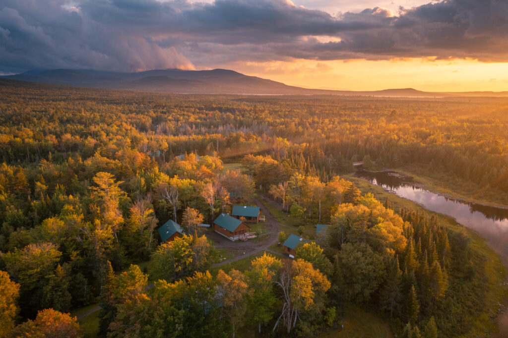 Medawisla lodge and cabins from above at sunset.