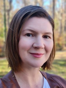 Headshot of Mandy Warner smiling at the camera.