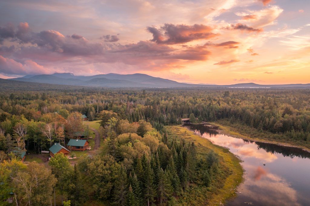 Aerial shot of Medawisla Lodge at sunset.