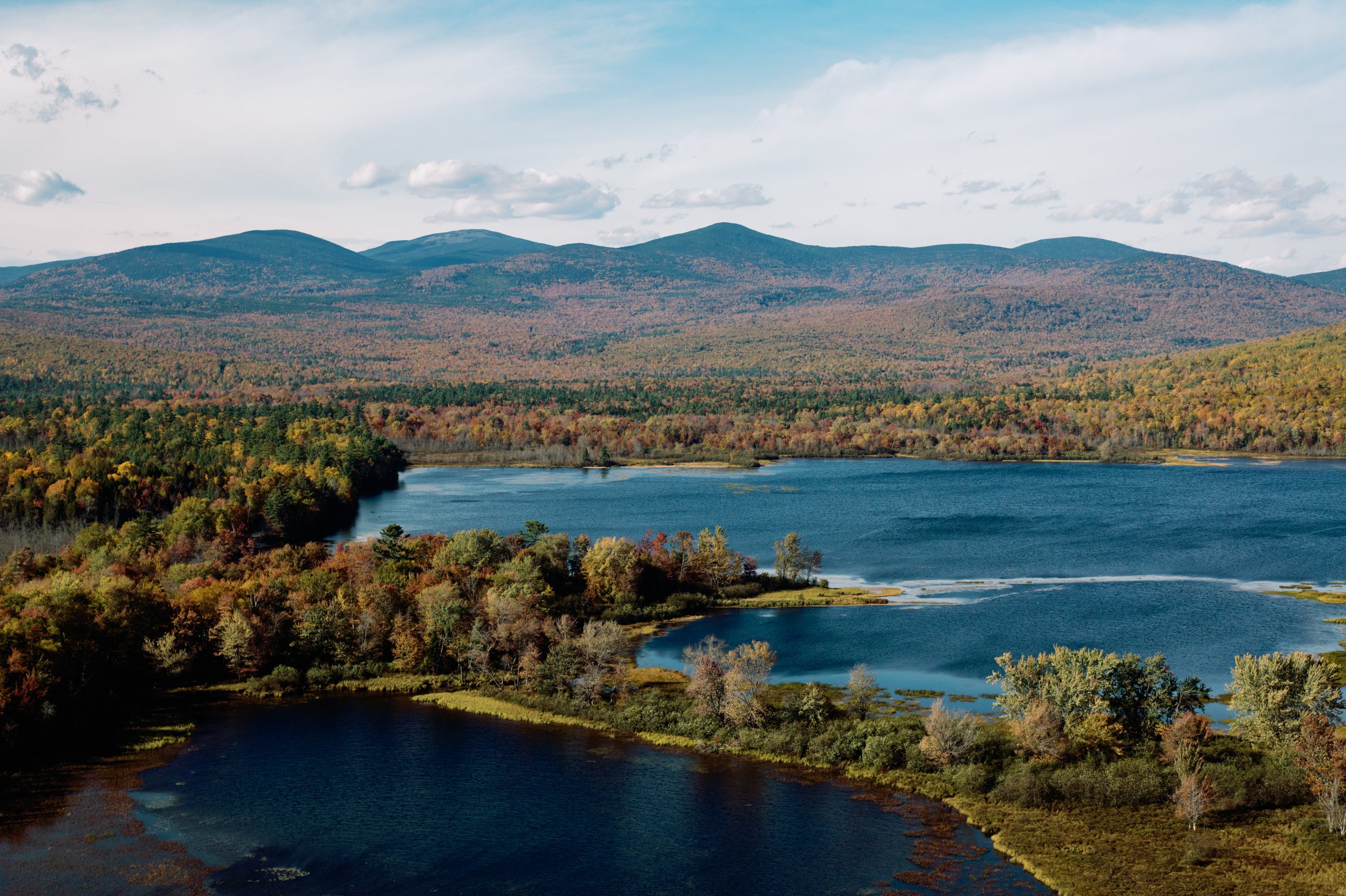 Aerial shot of Whitecap Forest--mountains with water.