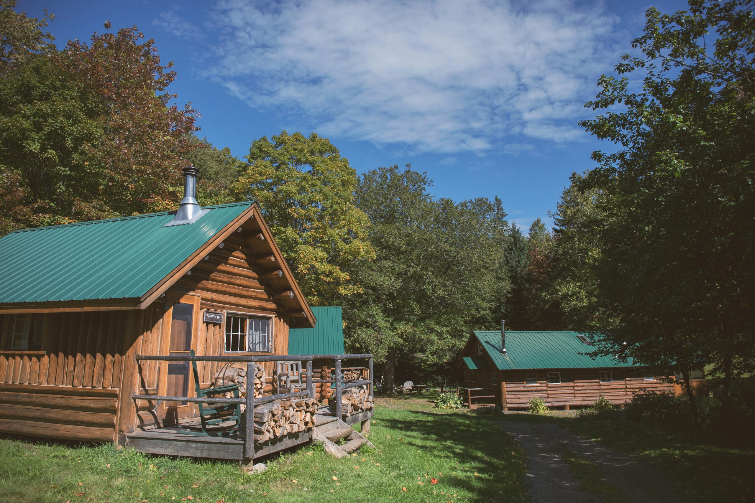 Little Lyford Lodge and Cabins, brown cabin with green roof.